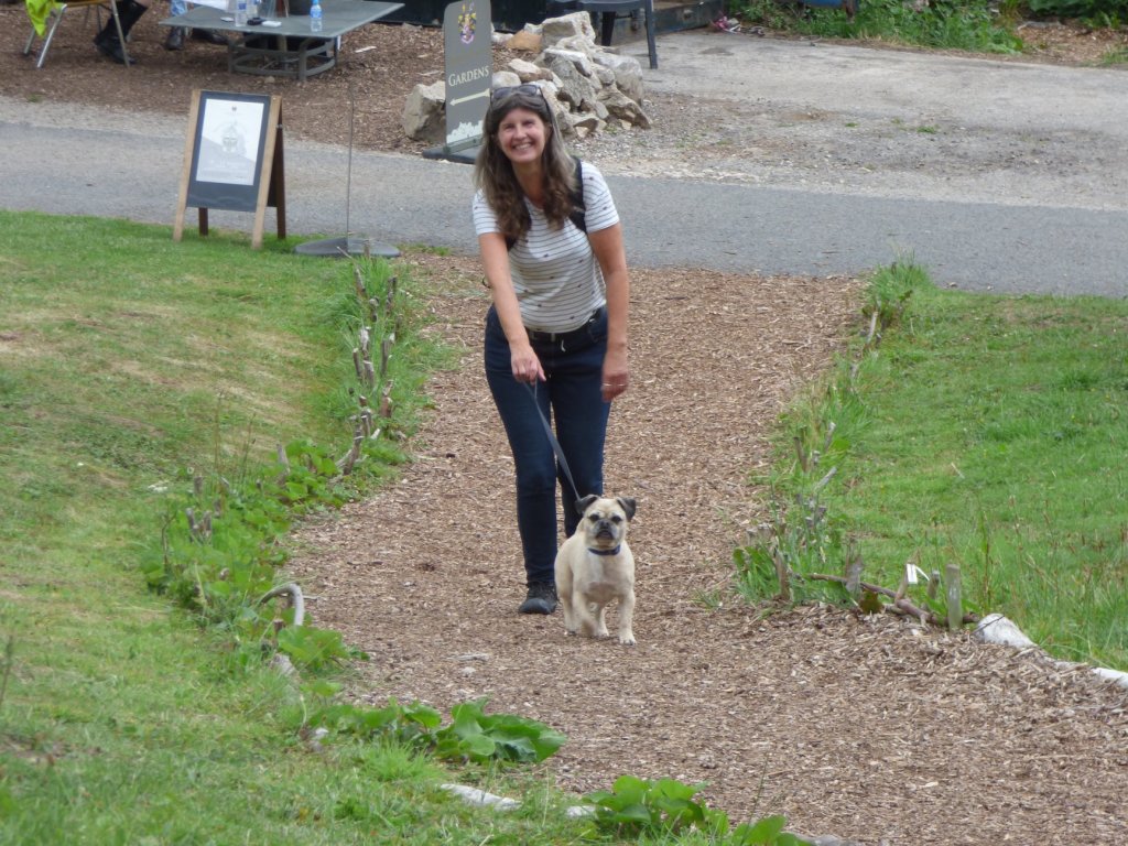 Diane, who runs writing workshops in and around Abergele, Conwy, and around Denbighshire, and Flintshire, and wrote The Little Yellow Boat, seen here walking up to run a storytelling workshop at Gwrych Castle with her dog, Renly