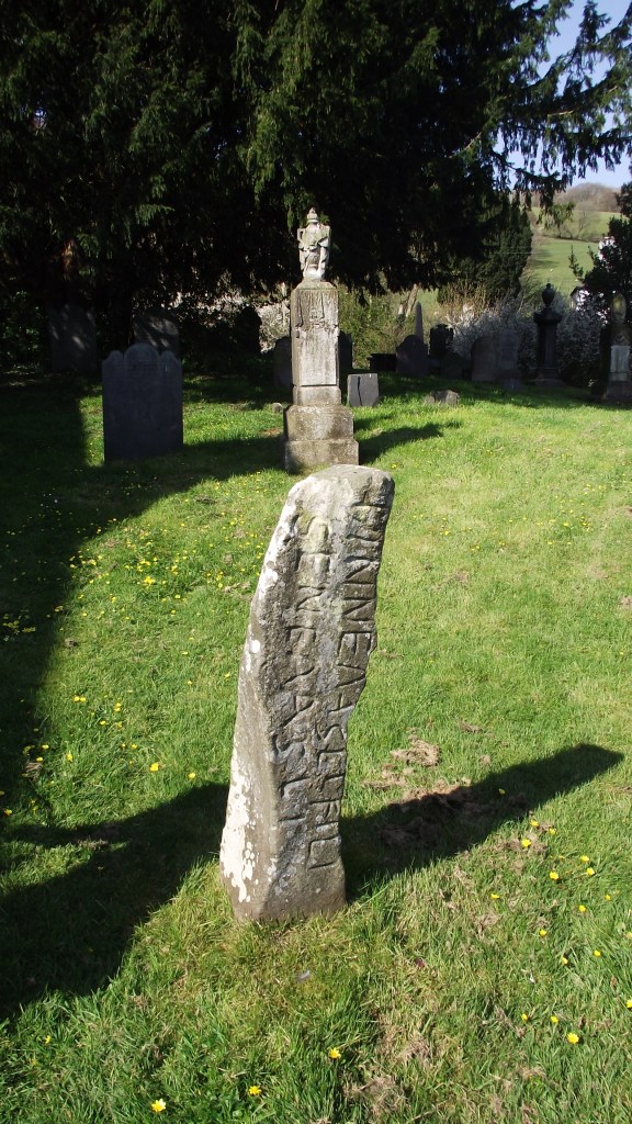 The ogham stone at Gwytherin, Conwy, churchyard