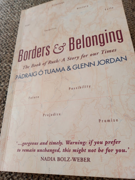 Front cover of the book “Borders & Belonging” by Pádraig Ó Tuama and Glenn Jordan. As read by Diane Woodrow